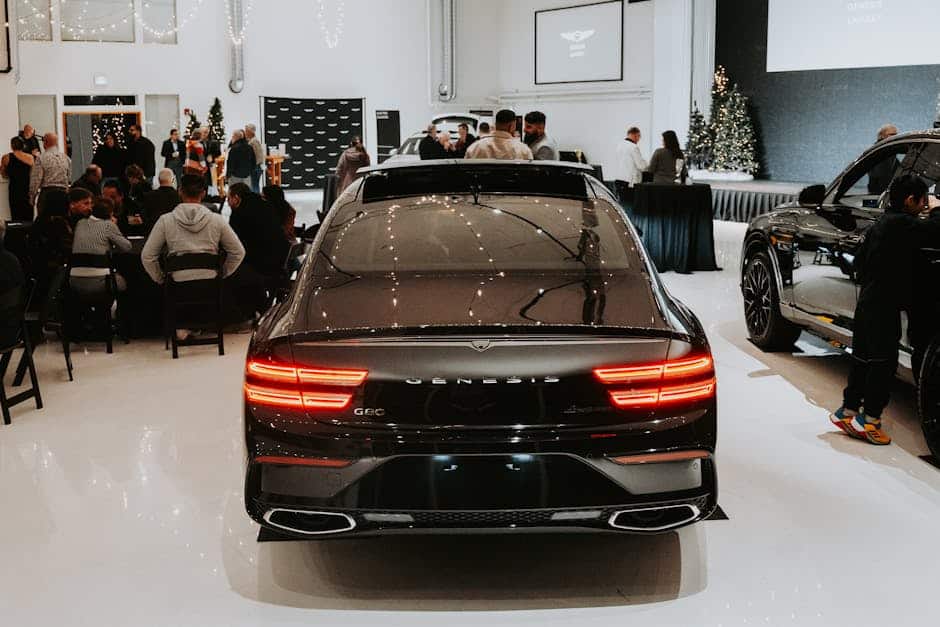 Customized luxury car at Rivercity Screenprinting event, showcasing high-quality vehicle wraps.