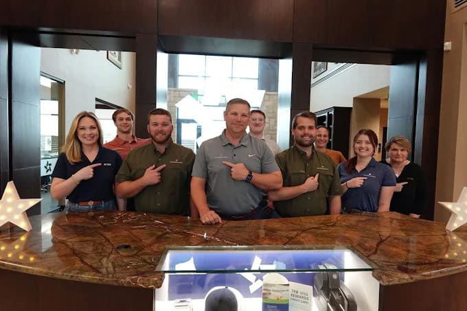 branded-workwear A team wearing their custom embroidered workwear.