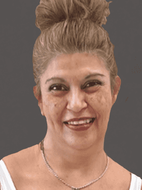 A smiling woman with light brown hair styled in a bun, wearing a white top and a silver necklace, against a dark background.